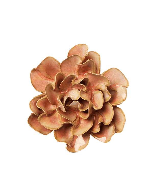 A single artificial flower bloom with layered ruffled petals in warm peach, tan, and light brown tones, isolated on a plain white background.