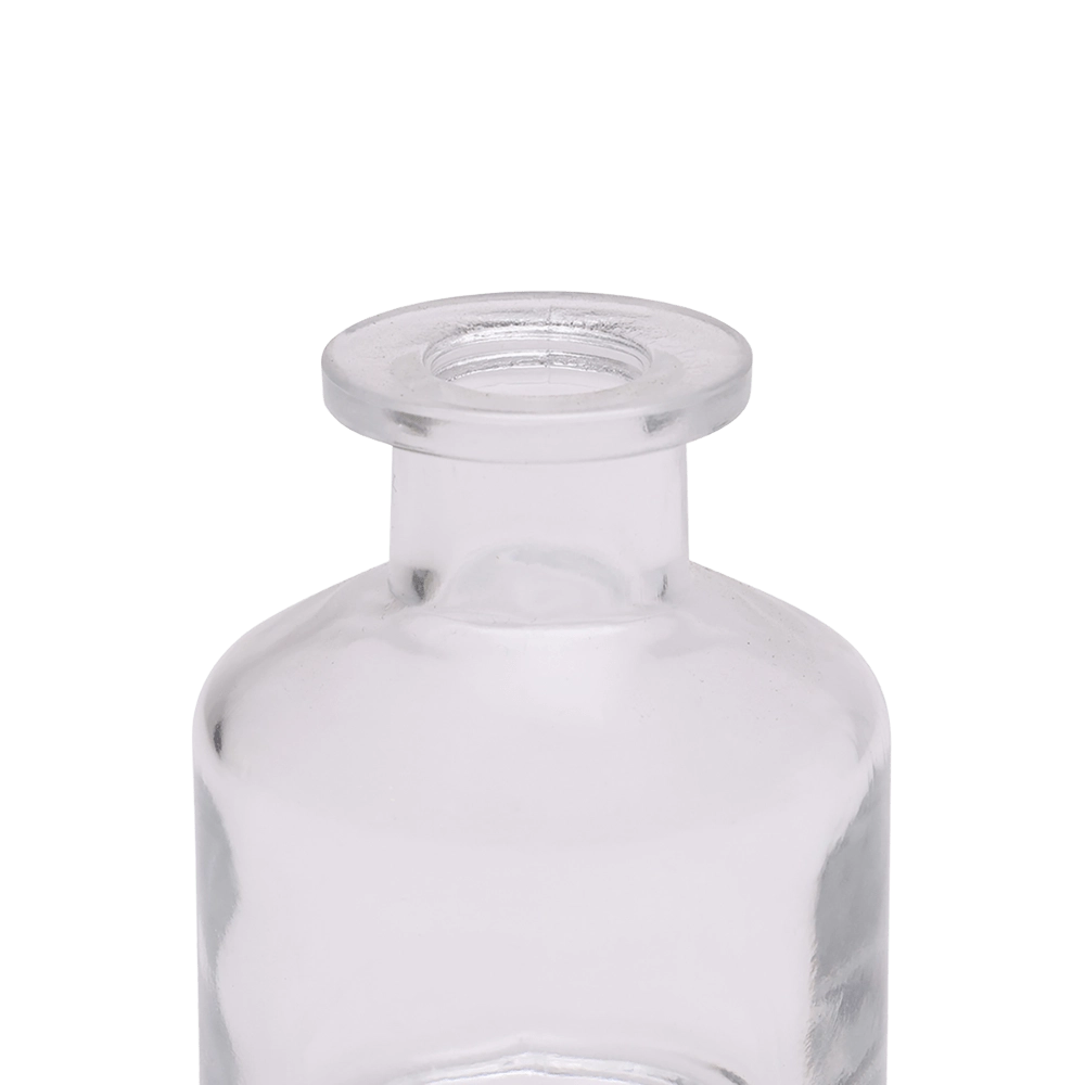 Chive Loft apothecary glass bud vase in clear glass, close-up on the wide flared lip.