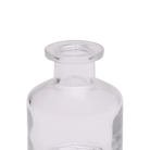 Chive Loft apothecary glass bud vase in clear glass, close-up on the wide flared lip.