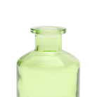 Chive Loft apothecary glass bud vase in green, close-up on the wide flared lip.