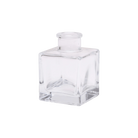 Chive Loft cube glass bud vase in clear glass with a raised collar neck and clean square silhouette.
