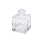 Chive Loft cube glass bud vase in clear glass, shown at an angle with a glossy faceted finish.