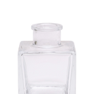 Chive Loft cube glass bud vase in clear glass, close-up on the raised collar neck.