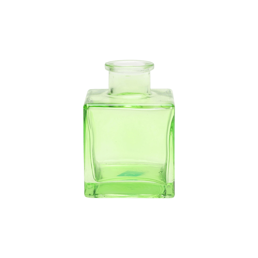 Chive Loft cube glass bud vase in green, straight-on view highlighting the sharp square edges.