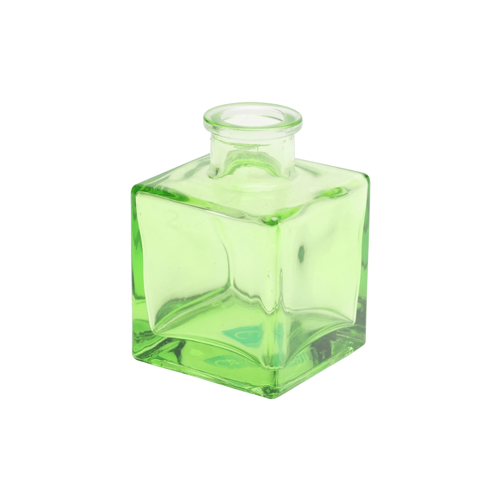 Chive Loft cube glass bud vase in green, straight-on view highlighting the sharp square edges.