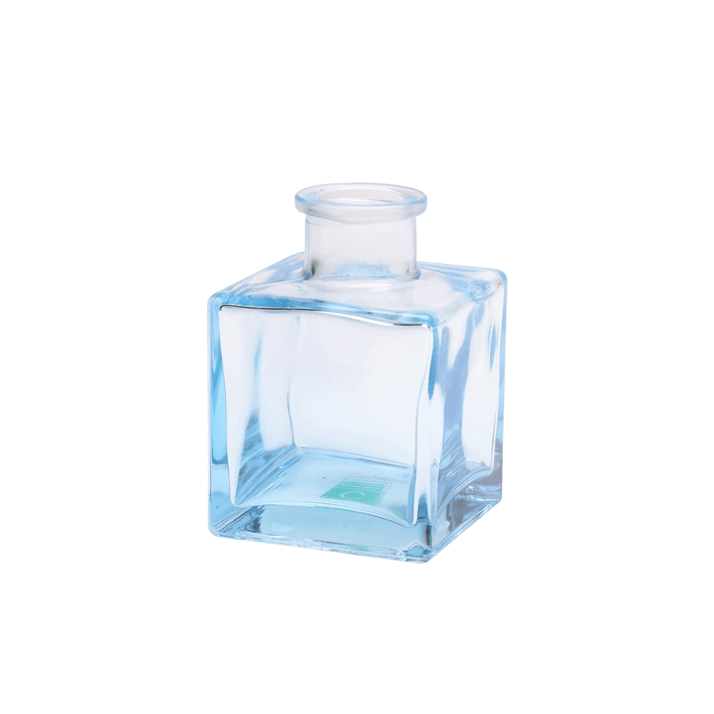 Chive Loft cube glass bud vase in light blue with a raised collar neck and clean square silhouette.