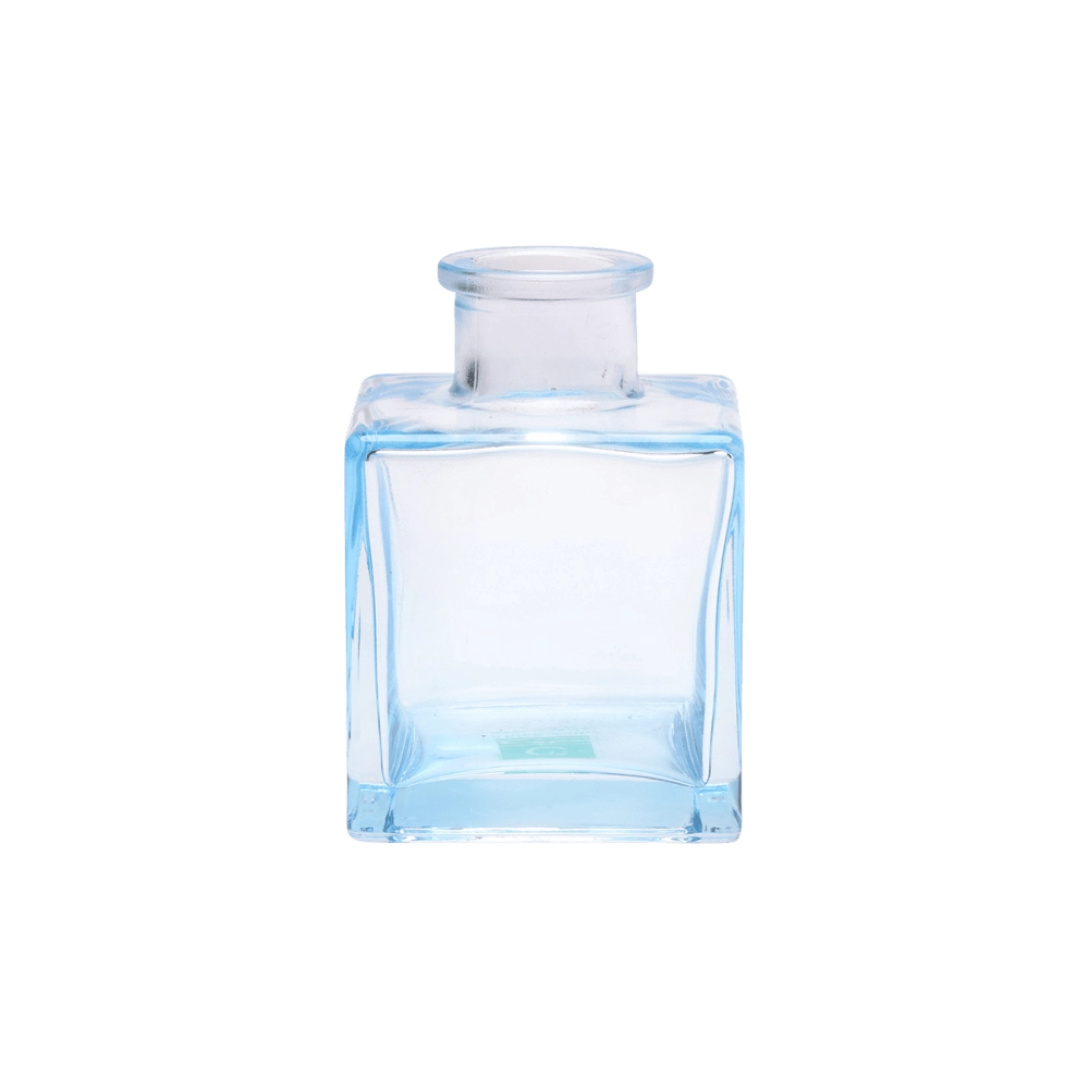 Chive Loft cube glass bud vase in light blue, straight-on view highlighting the sharp square edges.