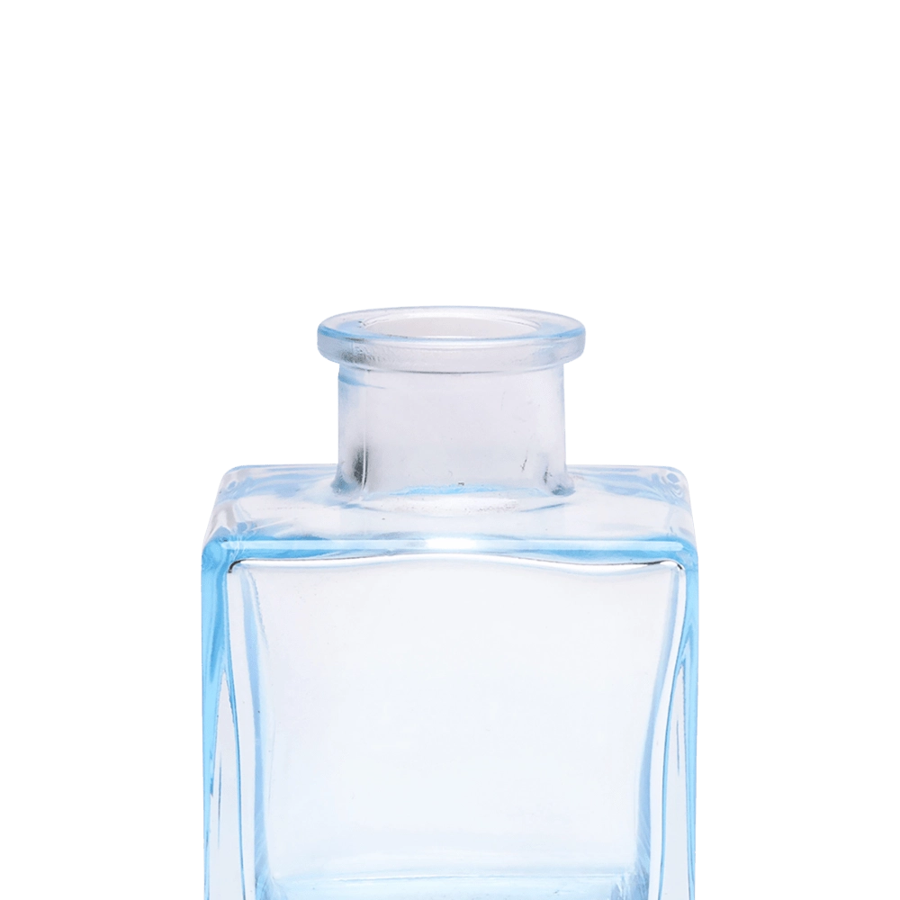 Chive Loft cube glass bud vase in light blue, close-up on the raised collar neck.