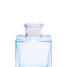 Chive Loft cube glass bud vase in light blue, close-up on the raised collar neck.