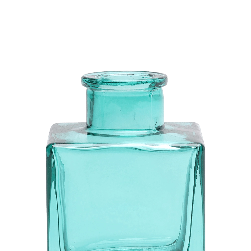 Chive Loft cube glass bud vase in teal, close-up on the raised collar neck.