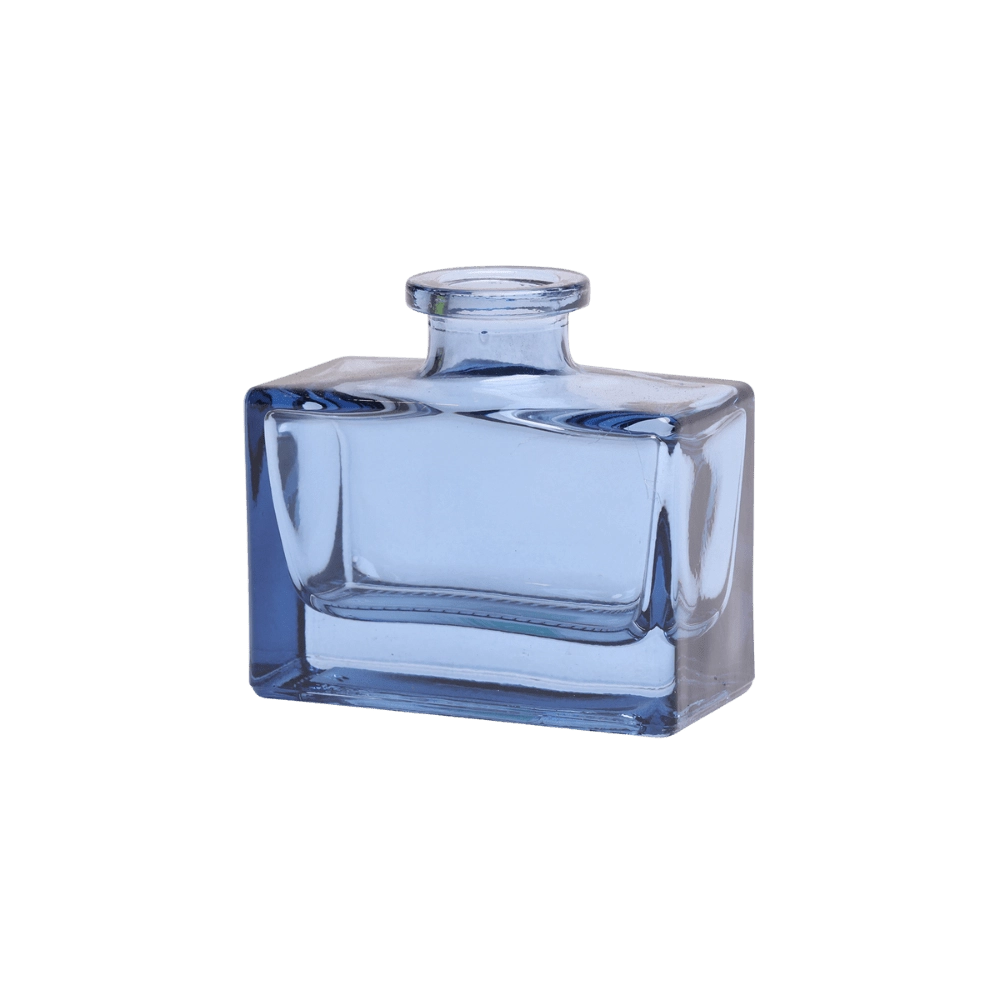 Chive Loft square glass bud vase in blue-grey, shown straight-on with a glossy faceted finish.