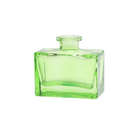 Chive Loft square glass bud vase in green with a clean rectangular silhouette and narrow neck.