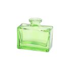 Chive Loft square glass bud vase in green, shown straight-on with a glossy faceted finish.