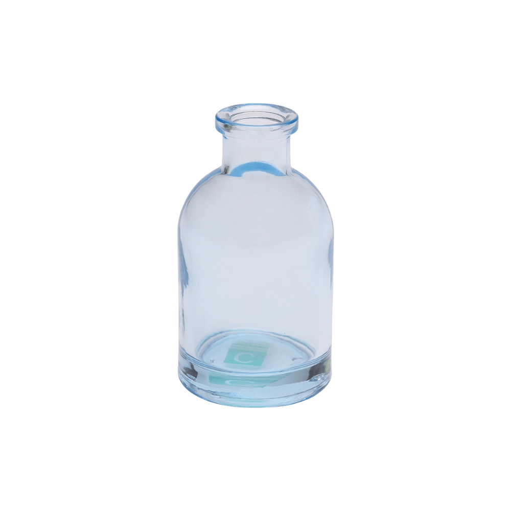 Chive Loft tall glass bud vase in light blue with a slender neck and rounded shoulder.