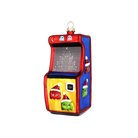 Chive glass arcade game ornament in red, yellow, and blue with festive ghost characters.