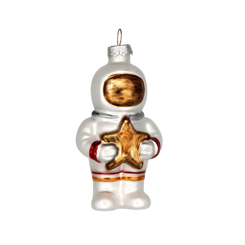 Chive glass astronaut ornament in white holding a gold glitter star.