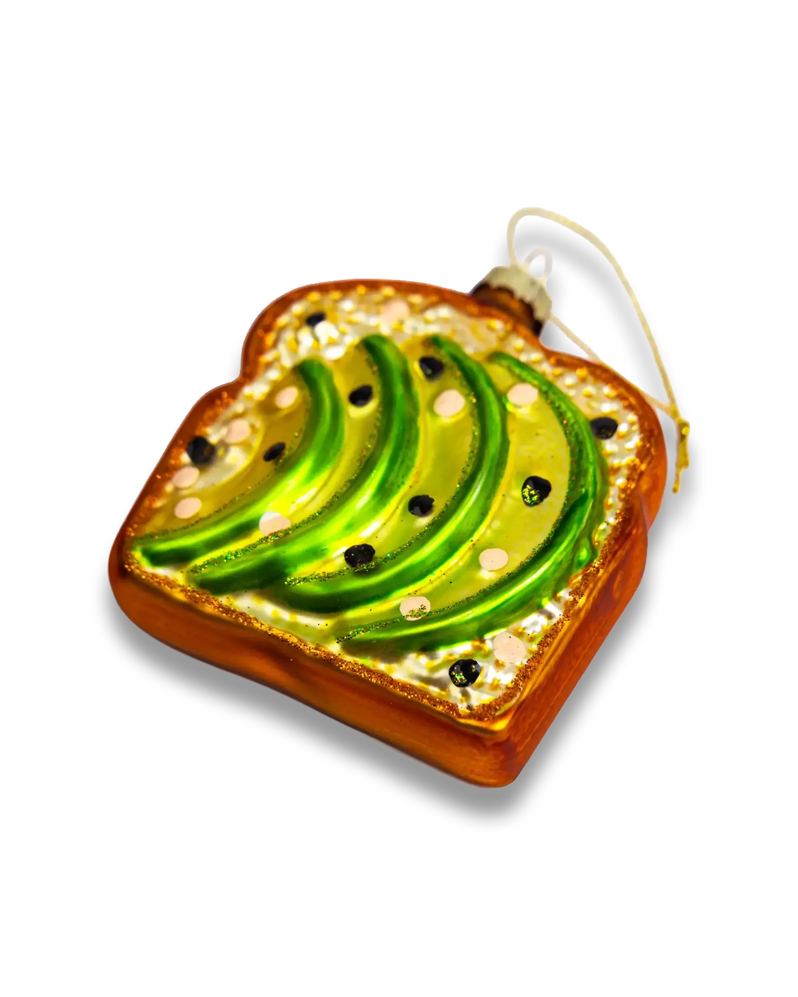 Chive glass avocado toast ornament with sliced avocado and seed sprinkle.