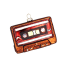 Chive glass cassette tape ornament in amber tones with a red and white label design.