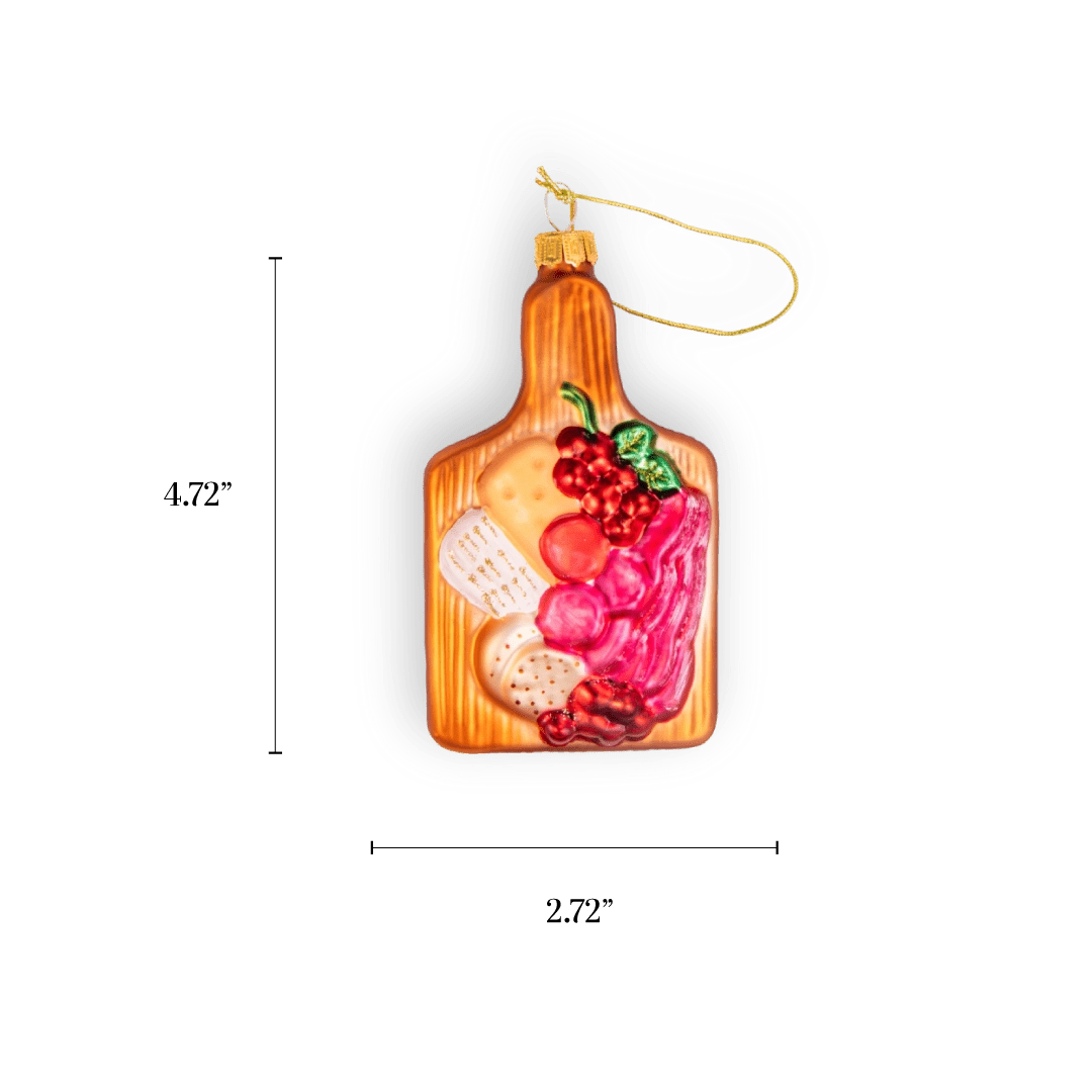 Chive glass charcuterie board ornament with cheese, grapes, and cured meat.