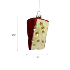 Chive glass cheese wedge ornament in red rind with golden holes.