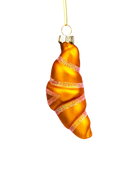 Chive glass croissant ornament showing its curved flaky texture.