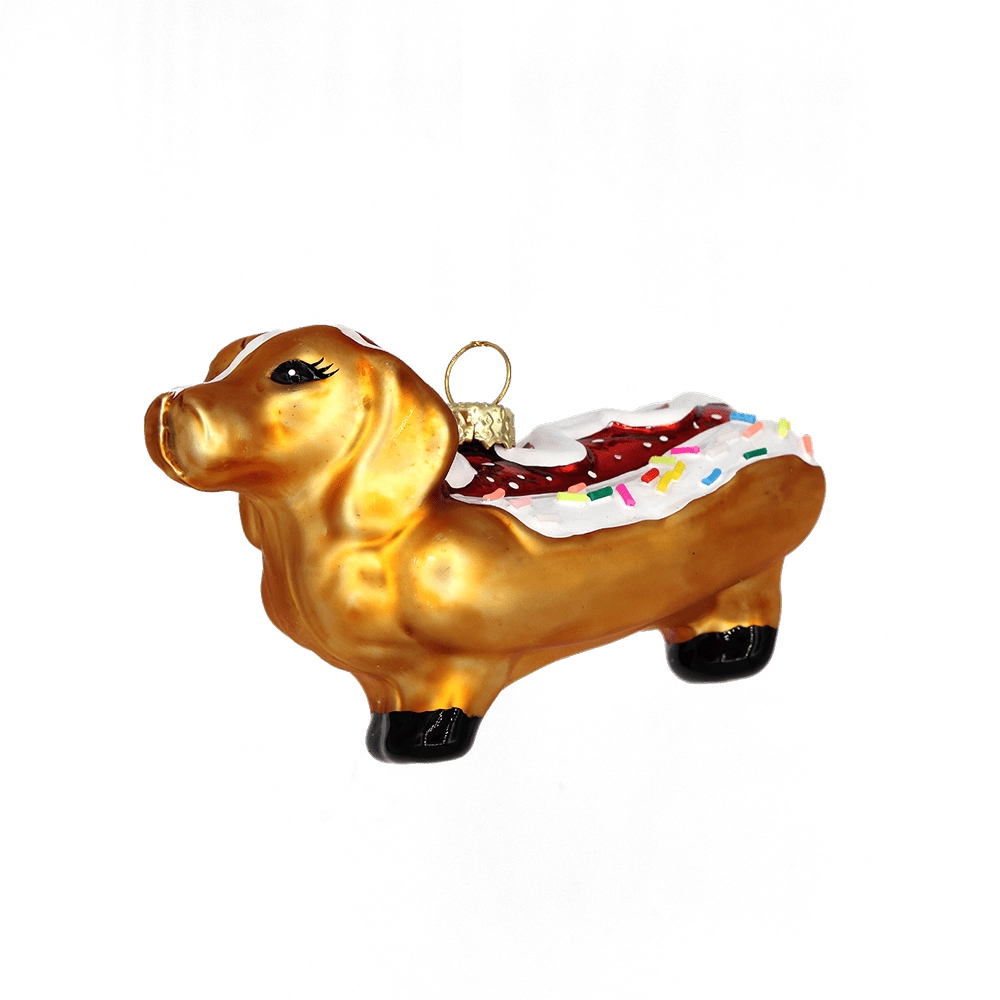 Chive glass dachshund ornament in gold with an iced pastry back and sprinkle detail.
