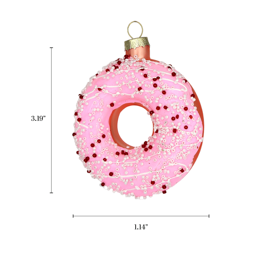 Chive glass donut ornament in pink with white icing drizzle and red beaded sprinkles.