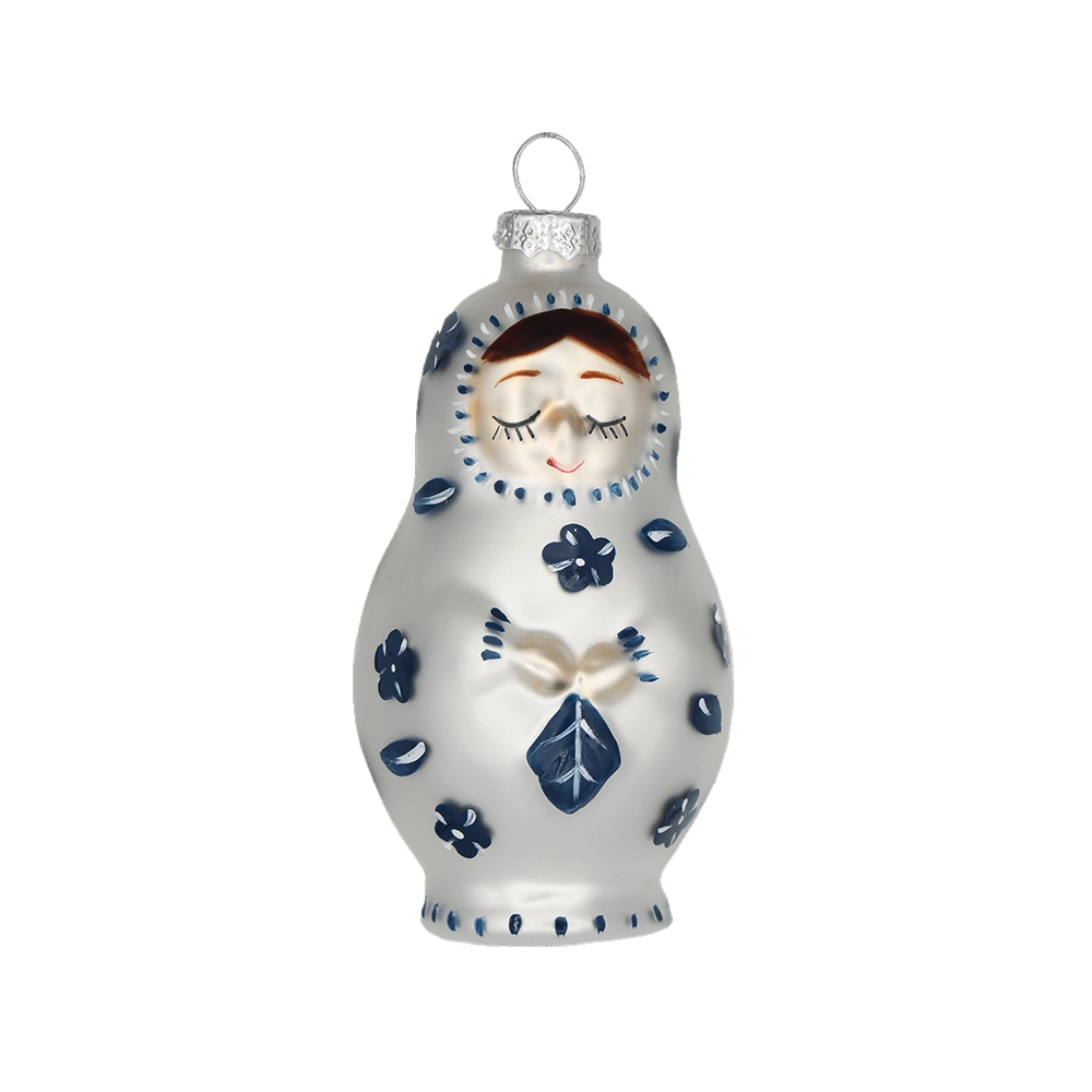Chive glass matryoshka doll ornament shown straight-on with a painted sleeping face.