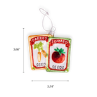 Chive glass seed packet ornament with carrot and tomato illustrations.