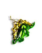 Chive glass stegosaurus ornament showing its curved tail and spiked back.