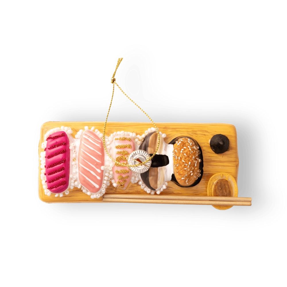 Chive glass sushi board ornament, overhead view of assorted nigiri toppings.