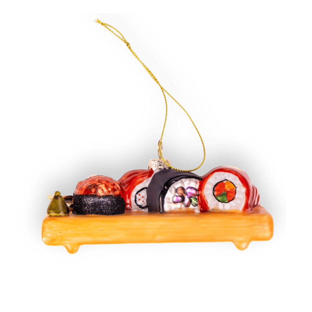 Chive glass sushi platter ornament on a wood-tone tray with rolls.