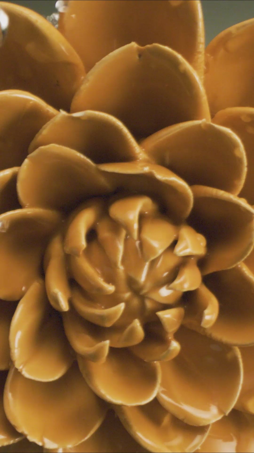 Orange fiesta marigold ceramic wall flower with water cascading over ceramic petals captured in slow motion — English Garden Collection — Chive Studio