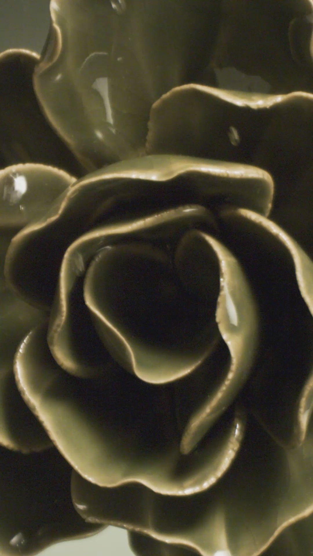 Fir green butterfly ranunculus ceramic wall flower with water cascading over ceramic petals captured in slow motion — English Garden Collection — Chive Studio