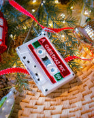 Cassette ornament styled on a decorated Christmas tree