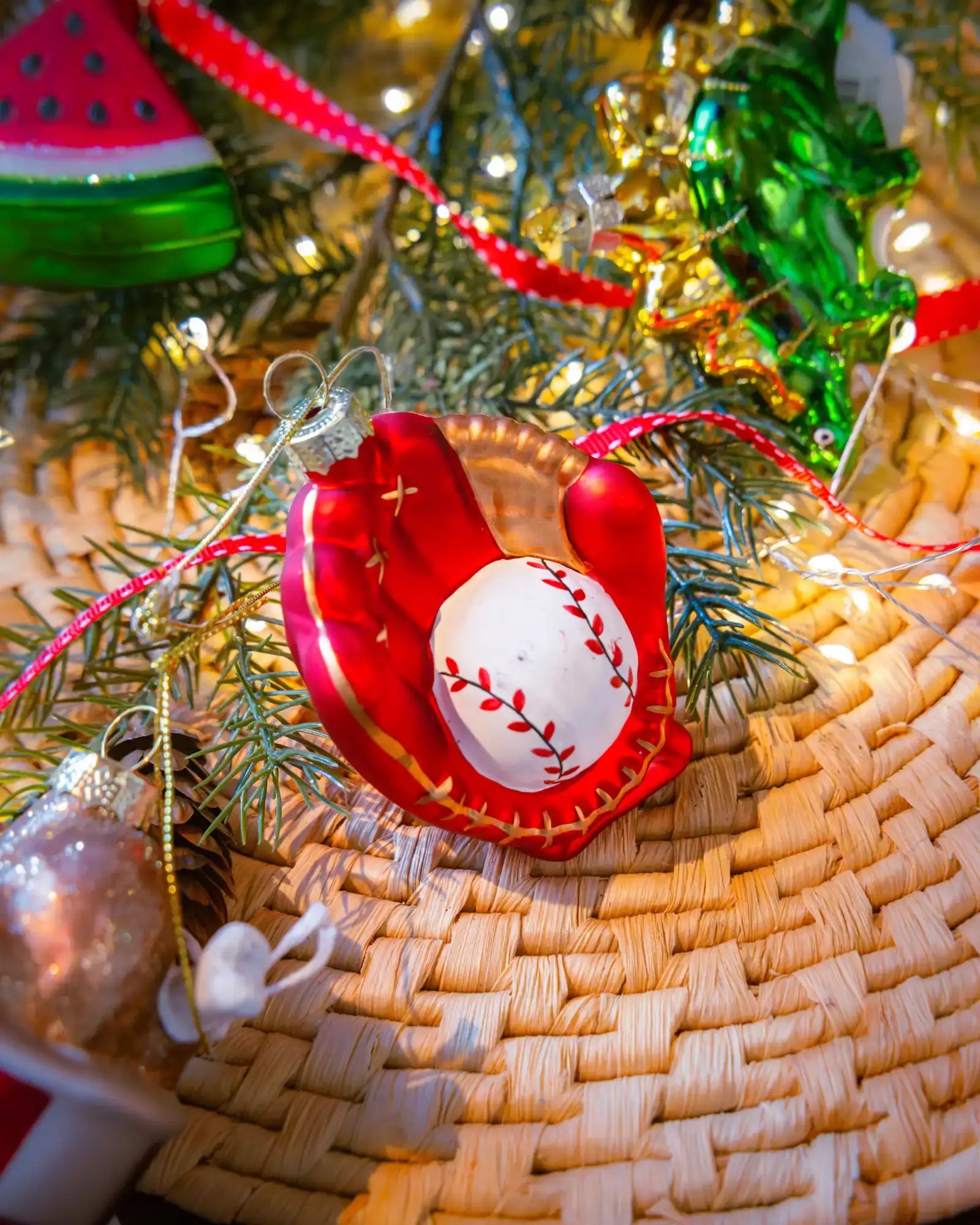 Baseball glove ornament styled on a decorated Christmas tree