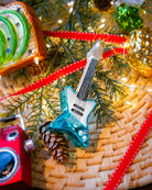 Blue Electric Guitar ornament styled on a decorated Christmas tree
