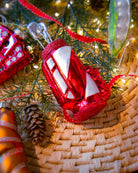 Golf clubs ornament styled on a decorated Christmas tree