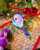 Tennis Racket ornament styled on a decorated Christmas tree