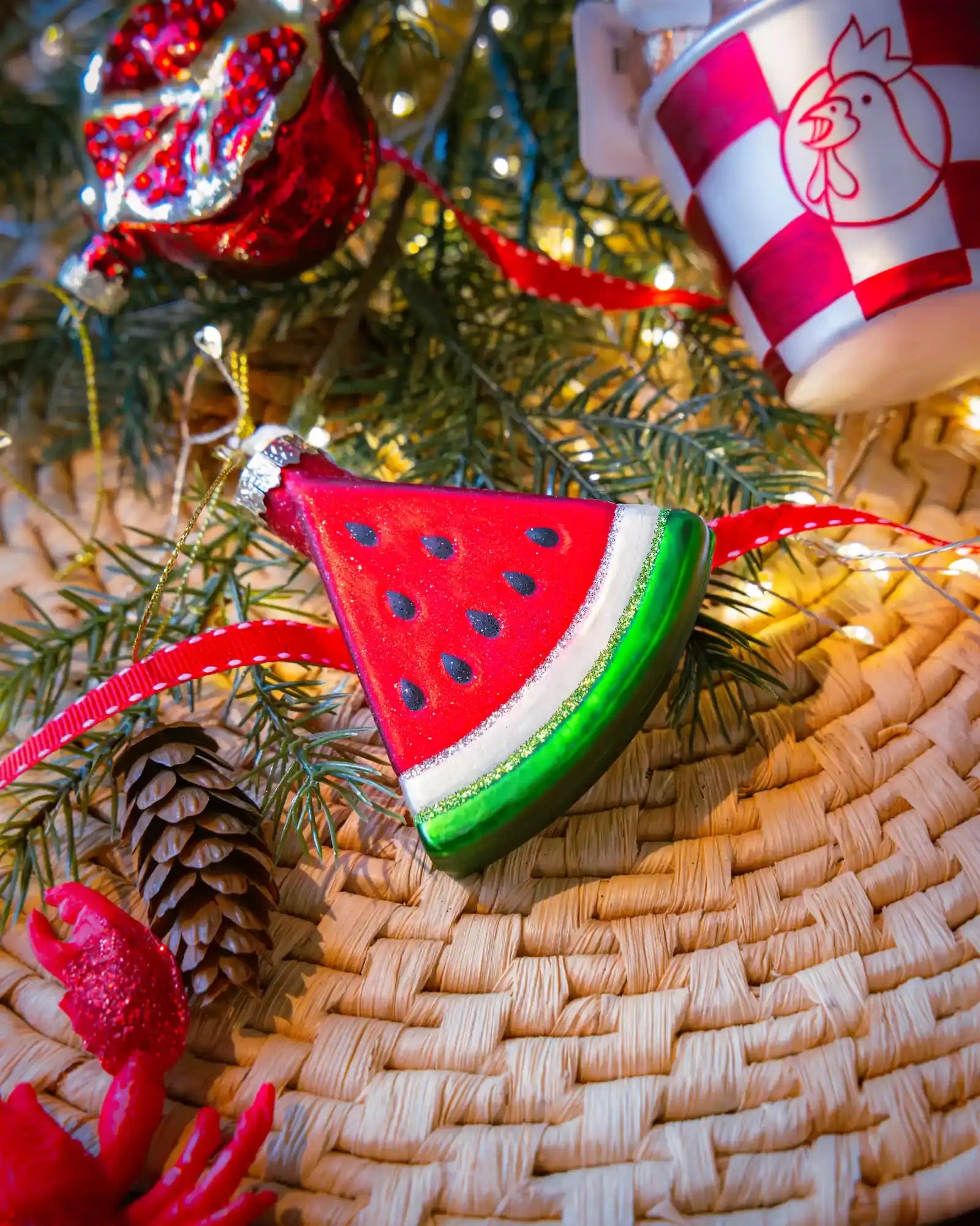 Triangular Watermelon ornament styled on a decorated Christmas tree