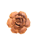 A single sculptural rose-shaped decorative object in a glossy warm brown finish, centered on a plain white background.