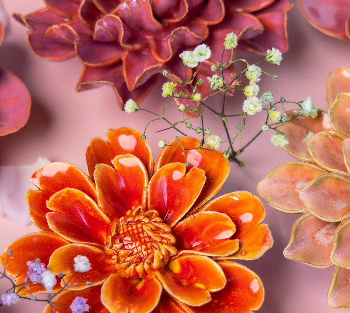 Chive ceramic flowers france collection, featuring orange and pink ceramic flowers.